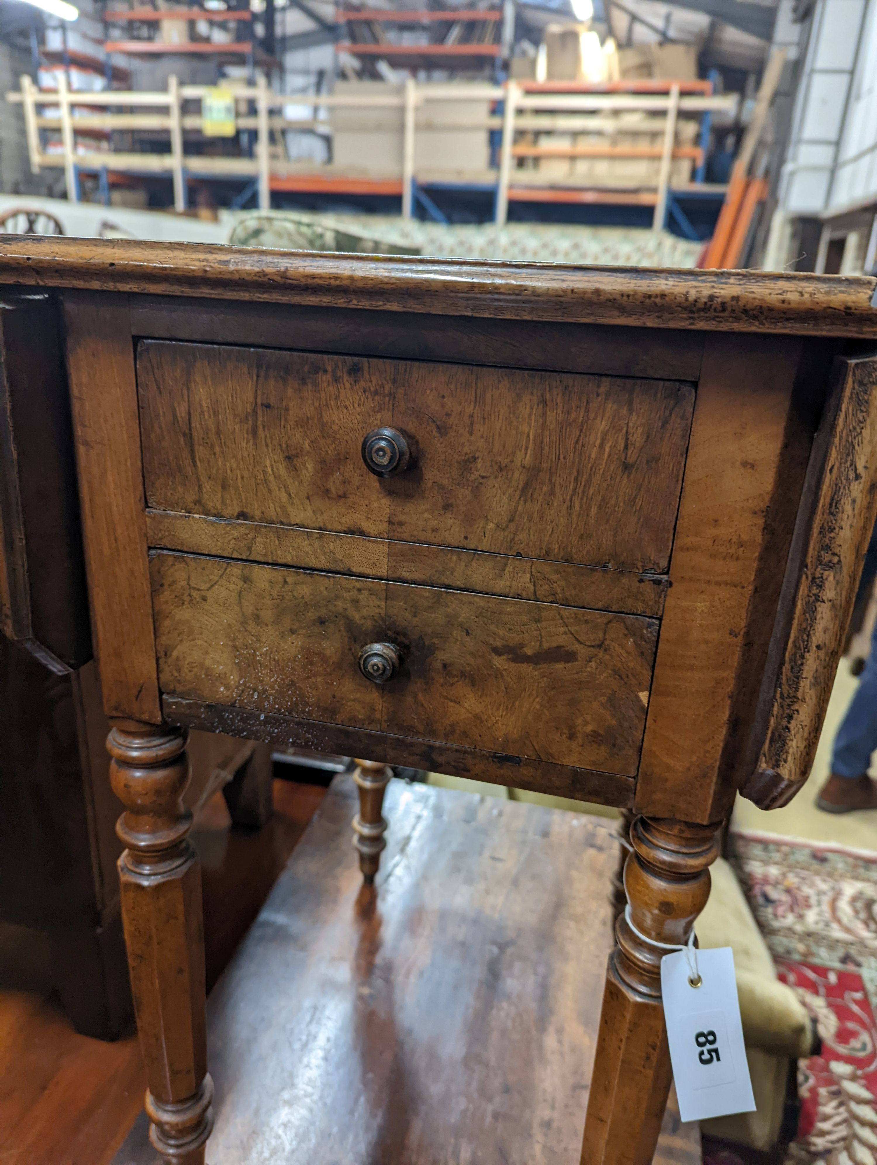 A 19th century French walnut drop flap work table, width 51cm, depth 36cm, height 68cm